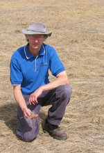 Dr Tim Apps checking soil during drought in Central Victoria.